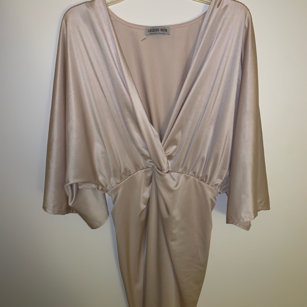 A silk dress, very beautiful and never worn